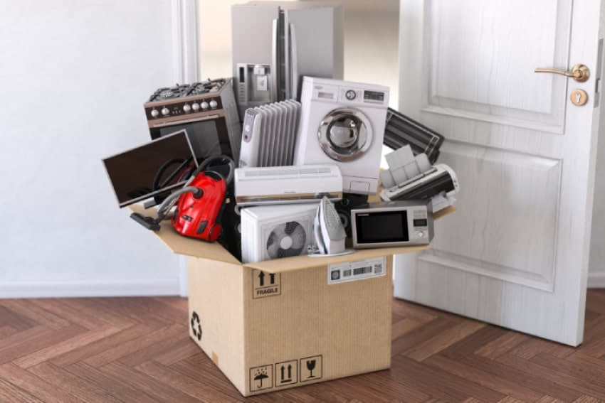 Appliances stuffed in moving boxes. Guide To Packing & Moving Home & Kitchen Appliances